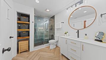 Shower, hair dryer, towels, soap