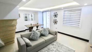 Classic Apartment, Balcony, City View | Living area | 32-inch flat-screen TV with digital channels