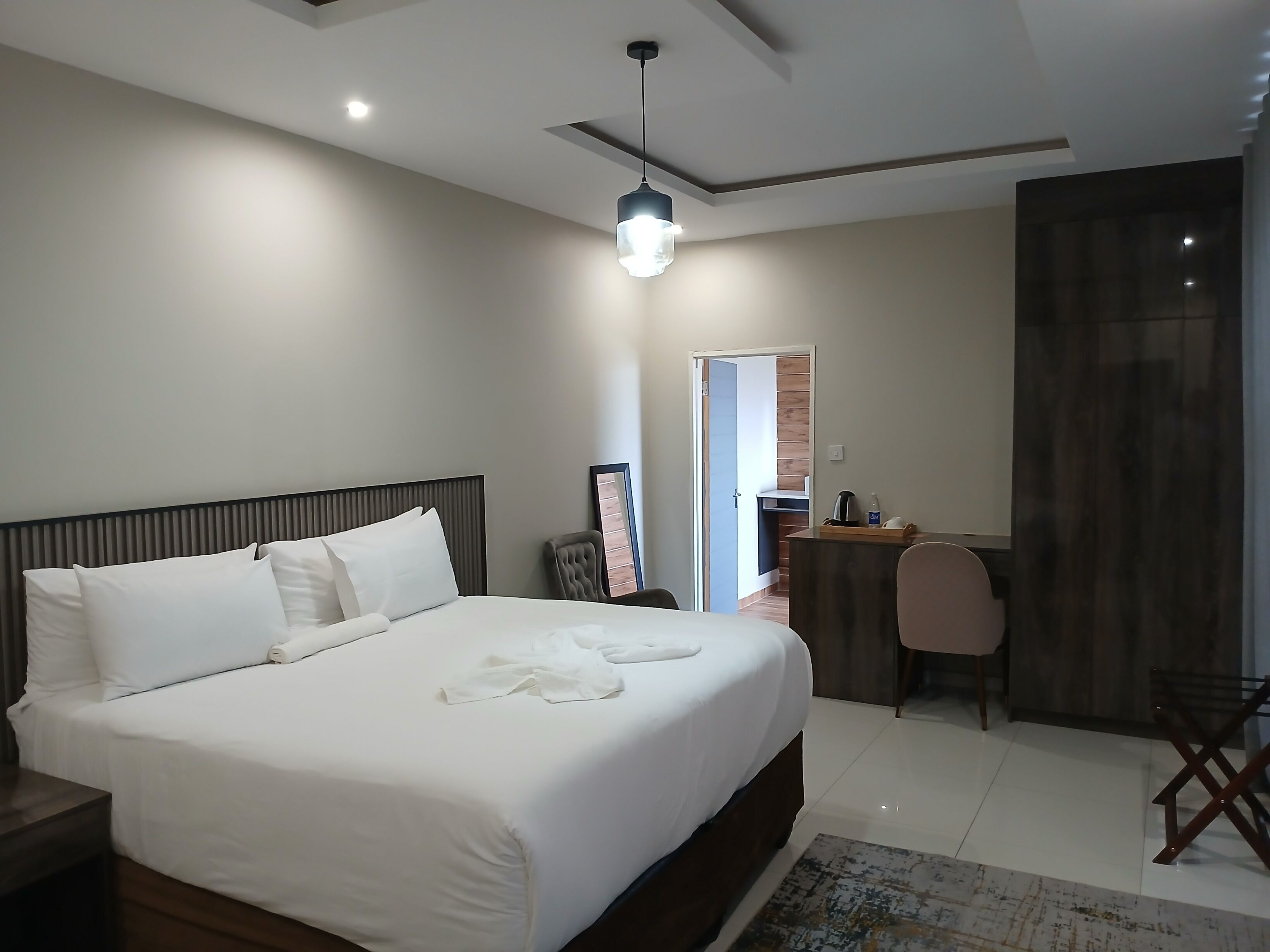 Family Double Room, Pool View | Desk, laptop workspace, iron/ironing board, free WiFi