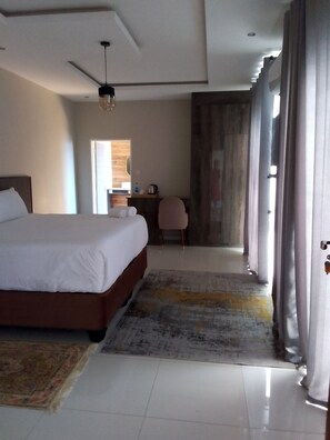 Family Double Room, Pool View | Desk, laptop workspace, iron/ironing board, free WiFi - Sewelo Inn (Maun)