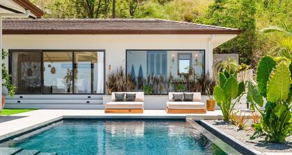 Luxe Tropical Villa with Sparkling Infinity Pool, Panoramic Ocean Views & Community Amenities