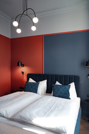 Suite, vue ville | 1 chambre, fer et planche à repasser, Wi-Fi gratuit
