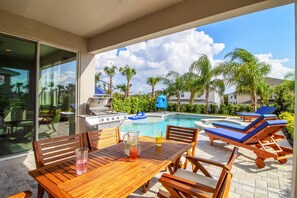 Outdoor dining - Last Minute Disney Getaway! Private Pool, Hot Tub & Game Room. Book Now! #116157 (Orlando)