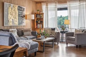 Casa de campo, vista al lago | Área de sala de estar