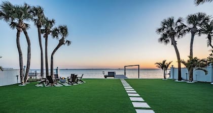 NEW Waterfront 6 bedroom home with large pool and luxurious outdoor living area!
