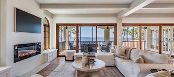 NEW Waterfront 6 bedroom home with large pool and luxurious outdoor living area!