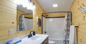 Shower, towels, toilet paper