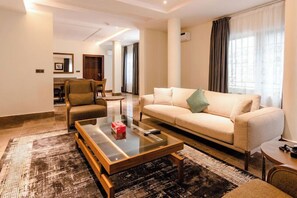 Comfort Apartment, Balcony, City View | Living area - Pradav Apartment (Abuja)