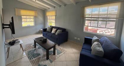 Spacious Upstairs 3-bedroom apartment with AC, WiFi in delightful Christ Church.