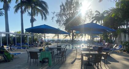 Private Pool access and 1 minute walking distance to the beach.