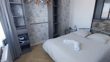 1 chambre, fer et planche à repasser, Wi-Fi gratuit, draps fournis