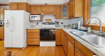 Secluded waterfront home with private dock, outdoor dining, firepit, WiFi & W/D