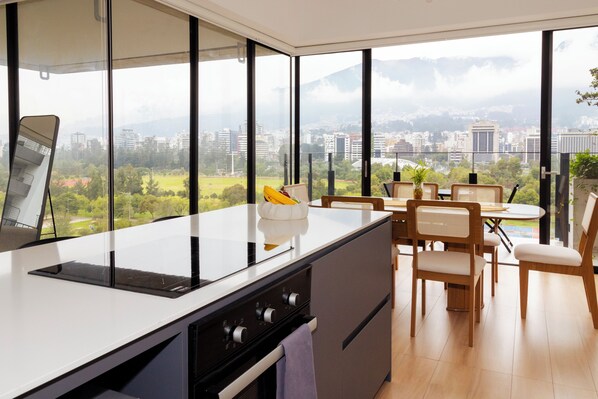 Apartment, 3 Bedrooms | Living area | 32-inch flat-screen TV with cable channels