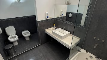 Shower, bidet, towels, soap