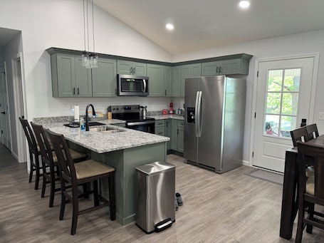 Fridge, microwave, oven, stovetop. New construction 3-bedroom home less than 1 mile from Kentucky Lake