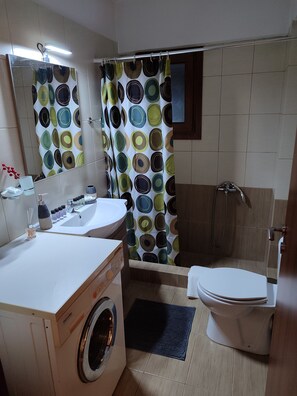 Hair dryer, towels, soap, toilet paper