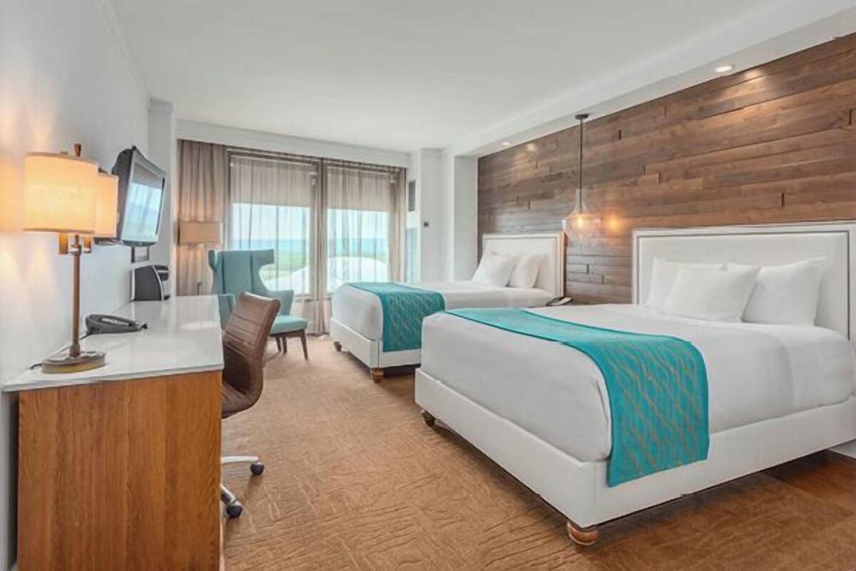 Deluxe Room, 2 Queen Beds | In-room safe, iron/ironing board, free WiFi
