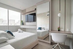 Apartment (1112) | Desk, laptop workspace, blackout drapes, iron/ironing board - Distrito 90 By Hostpro (Barranquilla)