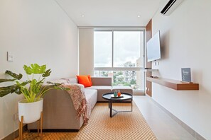 Apartemen Deluks | Area keluarga | Televisi LED 50-inci dengan saluran TV kabel