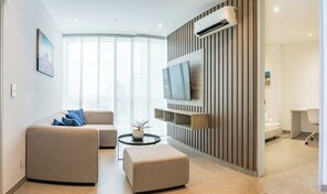 Apartemen Deluks | Area keluarga | Televisi LED 50-inci dengan saluran TV kabel