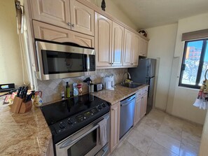 Microwave, oven, stovetop, dishwasher - Sunshine Ocean & Marina View Condo - Terrasol 341 Cabo San Lucas (Cabo San Lucas)