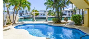 Summerland Airport Hangar Home with Pool, Private Runway and deep wide Canal