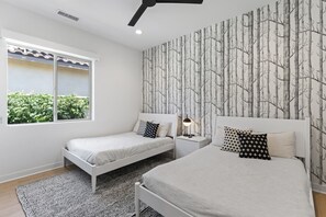 3 bedrooms, desk, iron/ironing board, travel cot