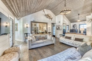 Smart TV, fireplace, books, printers