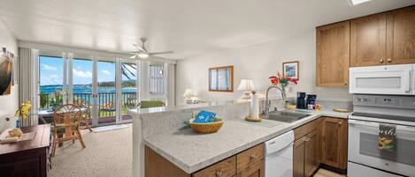 Microwave, stovetop, coffee/tea maker, dining tables