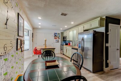 Happy Palette Home: Close to downtown+the lake! Fenced yard with outdoor dining