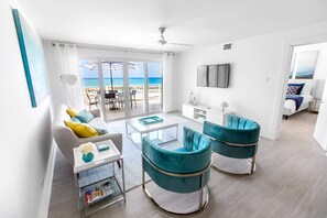 Luxury Condo, 3 Bedrooms, Beach View, Beachfront | Living room | 55-inch Smart TV with cable channels