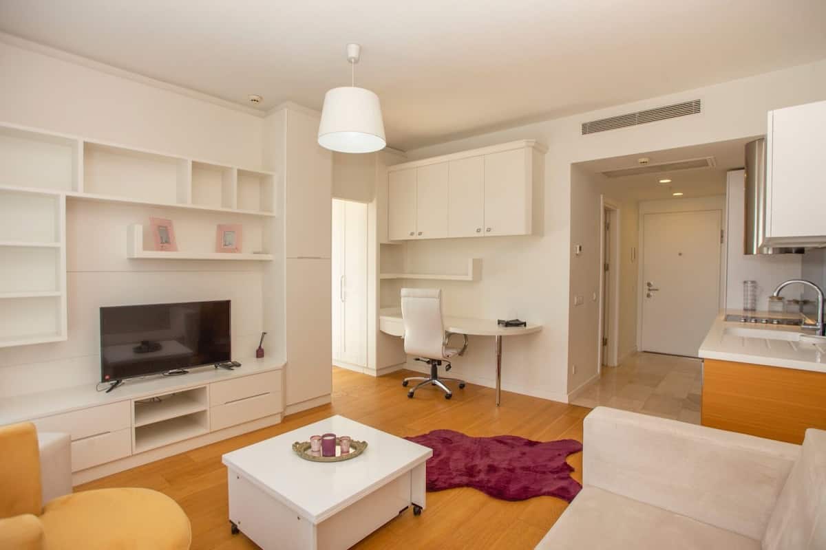 Comfort Condo, Kitchen, City View | Living area | 80-cm LED TV with satellite channels