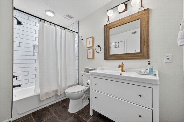 Hair dryer, towels, soap, toilet paper