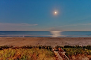 On the beach, sun loungers, beach towels