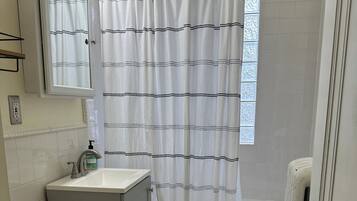 Hair dryer, towels, soap, shampoo