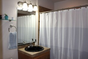 Hair dryer, towels, soap, shampoo