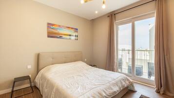 1 slaapkamer, een strijkplank/strijkijzer, wifi, beddengoed