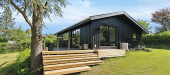 Cottage with fjord view in lovely Vellerup