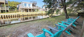 NEWLY RENOVATED! Canal Front, Water Views, Screened in Porch, Sun Deck