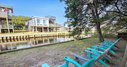 NEWLY RENOVATED! Canal Front, Water Views, Screened in Porch, Sun Deck
