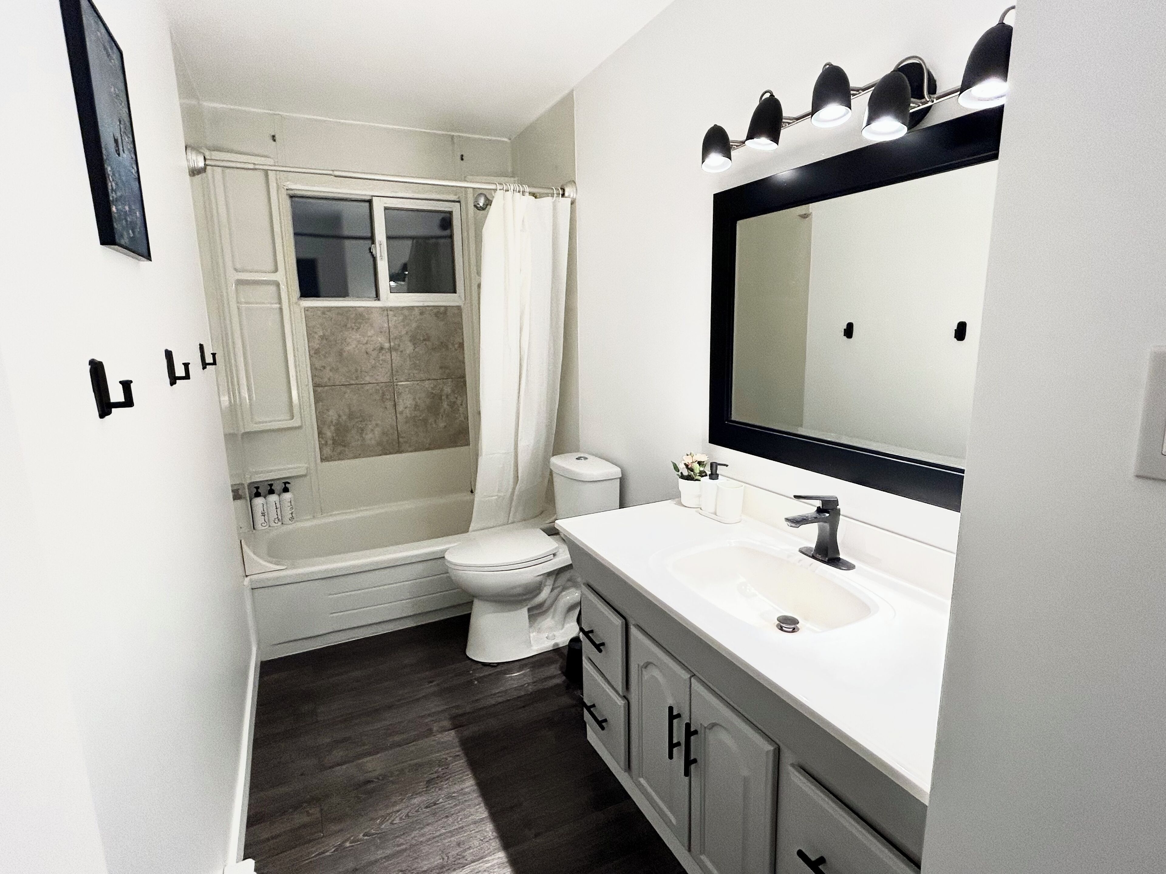 Shower, hair dryer, towels, shampoo