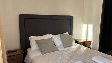 2 habitaciones, tabla de planchar con plancha y wifi gratis