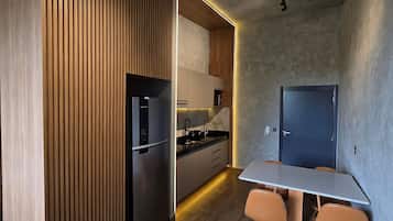 Design Apartment | Private kitchen | Fridge, microwave, stovetop, cookware/dishes/utensils