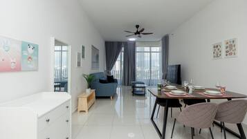 Deluxe Apartment, Balcony, City View | Living area | 43-inch Smart TV with cable channels, Netflix, streaming services