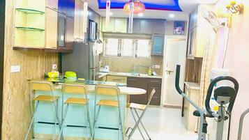 Fridge, stovetop, electric kettle, toaster