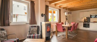 Chalet directly at the ski slope with a garden