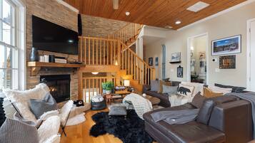 Télévision, cheminée, baby-foot