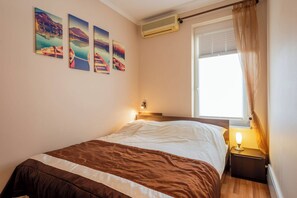 1 habitación, tabla de planchar con plancha, wifi y ropa de cama