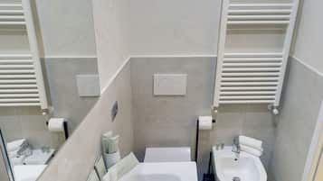 Shower, free toiletries, hair dryer, slippers
