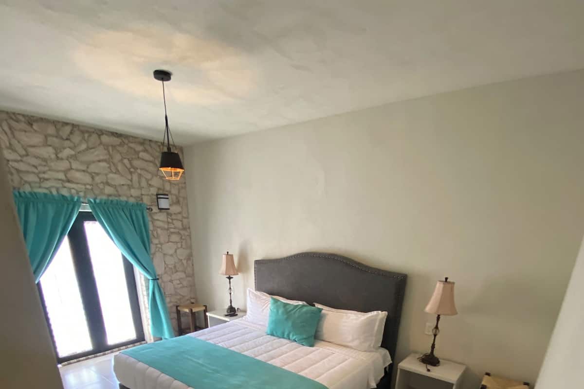 Comfort Room, 1 Bedroom, Balcony | 1 bedroom, iron/ironing board, free WiFi, bed sheets